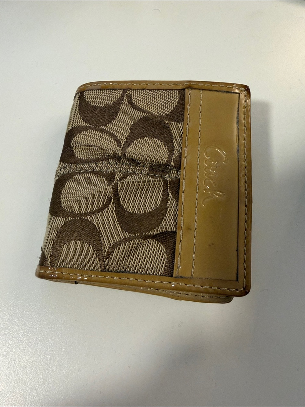 COACH Women’s Monogram Canvas Wallet in Brown and Tan